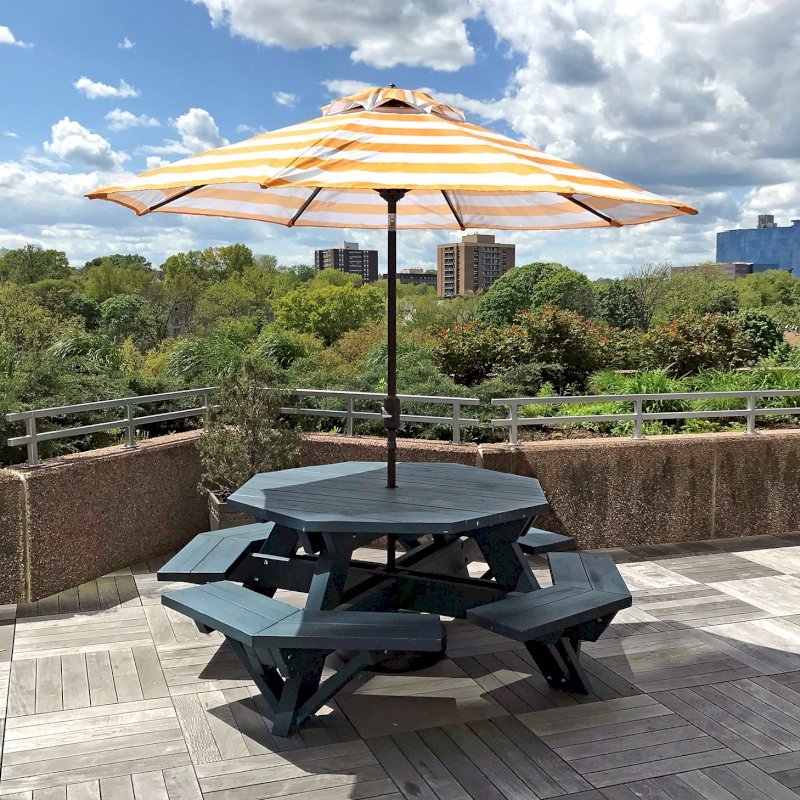 Octagonal Picnic Table (Options: 5' Diameter Tabletop, Attached Benches, Douglas-fir, Standard Tabletop, Rounded Corners, 2" Umbrella Hole, Custom Paint). Photo Courtesy of T. Dunne of Stamford, Connecticut. Octagonal Picnic Table (Options: 5' Diameter Tabletop, Attached Benches, Douglas-fir, Standard Tabletop, Rounded Corners, 2" Umbrella Hole, Custom Paint). Photo Courtesy of T. Dunne of Stamford, Connecticut.