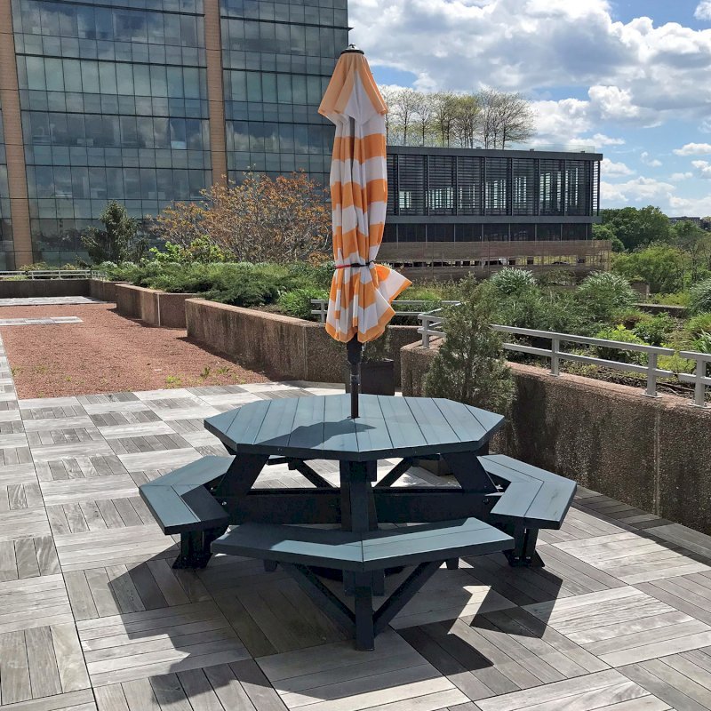 Octagonal Picnic Table (Options: 5' Diameter Tabletop, Attached Benches, Douglas-fir, Standard Tabletop, Rounded Corners, 2" Umbrella Hole, Custom Paint). Photo Courtesy of T. Dunne of Stamford, Connecticut. Octagonal Picnic Table (Options: 5' Diameter Tabletop, Attached Benches, Douglas-fir, Standard Tabletop, Rounded Corners, 2" Umbrella Hole, Custom Paint). Photo Courtesy of T. Dunne of Stamford, Connecticut.