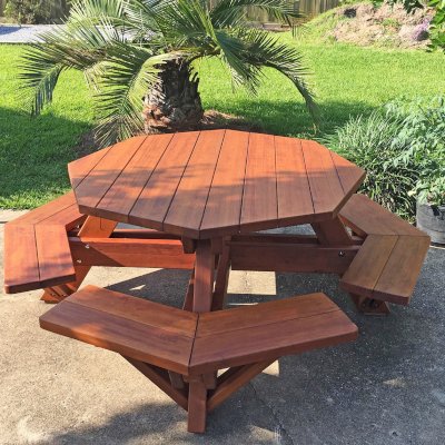 Octagonal Picnic Table (Options: 5' Diameter Tabletop, Attached Benches, Old-Growth Redwood, Standard Tabletop, Rounded Corners, No Umbrella Hole, Transparent Premium Sealant). Photo Courtesy of M. Gautier of Ocean Springs, MS.
