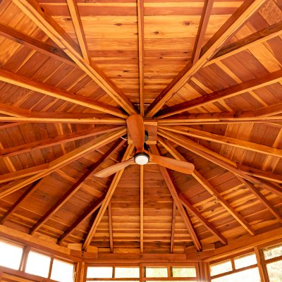 Octagonal Sunroom Gazebo (Options: 16' Diameter, Internal Deck, California Redwood, 24" H Siding Below Windows, 4 Standard Window Panels & 3 Custom Panels, Clear Acrylic, 1 Ceiling Fan Base, 1 Set of Doors, Transparent Premium Sealant). Photo Courtesy of D. Coons of Morgan Hill, California.