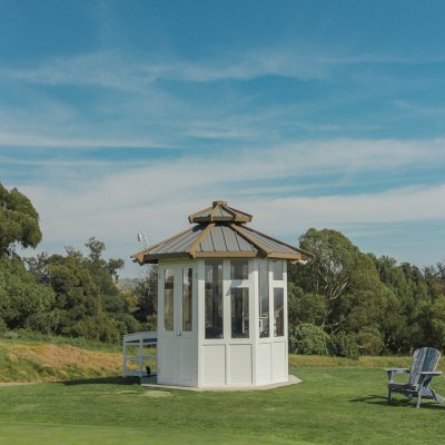 Octagonal Sunroom Gazebo (Options: 8' Diameter, No Deck, California Redwood, Metal Roof, 30" H Siding Below Windows, 7 Standard Window Panels, 1 Double Doors Panel, Clear Acrylic, No Ceiling Fan Base, Transparent Premium Sealant for Interior and Off-White Oil-Based Primer for Exterior). Photo Courtesy of Mr. Robert Nagelberg of The Saticoy Club, 4450 Clubhouse Drive Somis, CA 93066