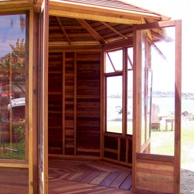 Octagonal Sunroom Gazebo (Options: 10', Deck, California Redwood, 24" H Siding Below Windows, Three Window Panels, Transparent Premium Sealant). 