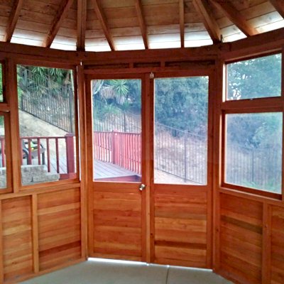 Octagonal Sunroom Gazebo (Options: 12' Diameter, No Deck, Douglas-fir, 36" H Siding Below Windows, 4 Window Panels & Solid Panels, 2 Sets of Doors, Transparent Premium Sealant). Photo Courtesy of Y. Fang of Diamond Bar, CA.