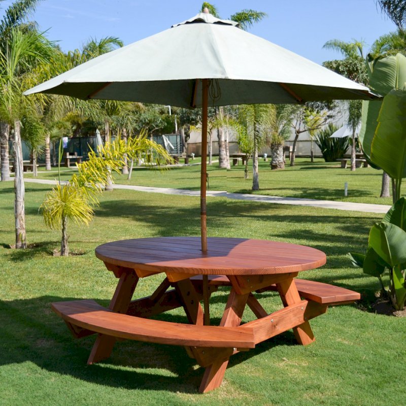 Oval Picnic Table (Options: Oval, Attached Side Benches, California Redwood, Standard Tabletop, Umbrella Hole, Transparent Premium Sealant). Umbrella not included. Oval Picnic Table (Options: Oval, Attached Side Benches, California Redwood, Standard Tabletop, Umbrella Hole, Transparent Premium Sealant). Umbrella not included.