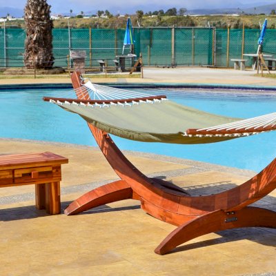 Oversized Coffee Table (Options: 36"L x 18" W x 18" H, Mosaic Redwood, 2 Drawers, Transparent Premium Sealant) and Noah's Hammock.