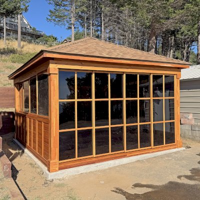 Sun Gazebo with Sliding Doors (Options: 16' L x 14' W, Mosaic Douglas, 8 ft Wall Height, No Skylight, with 2 Sliding Walls, 2 Custom Windows, Complete Floor, No Roofing, Transparent Premium Sealant). Photo Courtesy of K. Biederman of Whitehorn, CA.