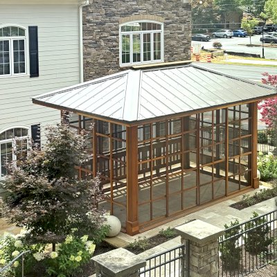 Sun Gazebo with Sliding Doors (Options: 18' L x 12' W, California Redwood, 9 ft Wall Height, Without Skylight, with 1 Sliding Wall and 3 Fixed Screen Panels Walls, Without Floor, Transparent Premium Sealant). Photo Courtesy of J. Mainor of Sandy Springs, GA.