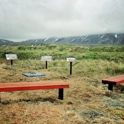 VA Wooden Bench at Alaska Maritime National Wildlife Refuge (Options: 6 ft, Mature Redwood, Extra Long Legs, No Cushion, No Engraving, Transparent Premium Sealant). This photo is at the battle ground site of the WWII battle at Attu Island and is part of the memorial to the dead from that battle with the Japanese on american soil.