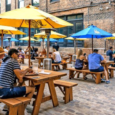 Heritage Large Wooden Picnic Tables at ''Green Street Smoked Meats'' Restaurant, 112 N Green St, Chicago, IL 60607 (Options: Several Sizes, 34 1/2'' W, Unattached Side Benches, Transparent Premium Sealant). Photo Courtesy of Jennifer Whang of Chicago, Illinois.