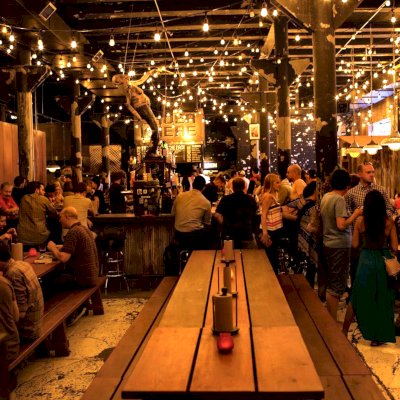 Heritage Large Wooden Picnic Tables at ''Green Street Smoked Meats'' Restaurant, 112 N Green St, Chicago, IL 60607 (Options: Several Sizes, 34 1/2'' W, Unattached Side Benches, Transparent Premium Sealant). Photo Courtesy of Jennifer Whang of Chicago, Illinois.