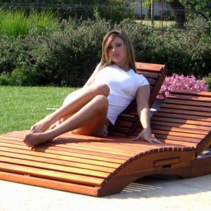 Curved Wooden Sun Lounger With a Smooth Wood Finish