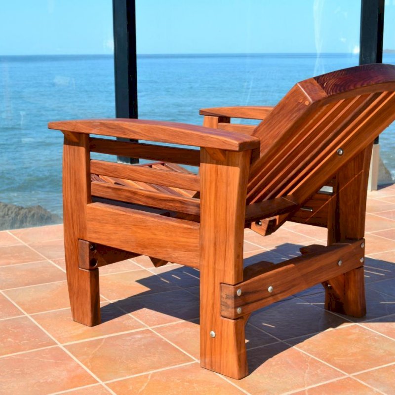Reclining Redwood Easy Chair (Options: Mature Redwood, No Cushion, Transparent Premium Sealant). Photo shows fully reclined position. Reclining Redwood Easy Chair (Options: Mature Redwood, No Cushion, Transparent Premium Sealant). Photo shows fully reclined position.
