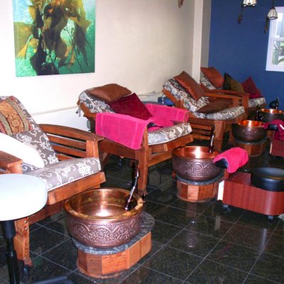 Reclining Redwood Easy Chair (Options: Old-Growth Redwood, Custom 4" Thick Cushions, Transparent Premium Sealant) - fully reclined position. Photo Courtesy of Oasis Nail Spa - Burbank, CA.