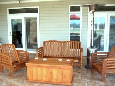 Reclining Redwood Loveseat (Options: Mature Redwood, No Cushion, Transparent Premium Sealant) and 2 Easychairs with a Traditional Storage Bench.