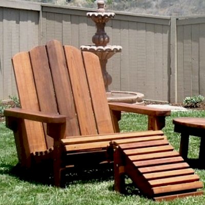 Redwood Adirondack Chair (Options: Extra Wide Size, Old-Growth Redwood, No Cushion, Transparent Premium Sealant). Shows Standard Ottoman and Round Side Table is partially visible.
