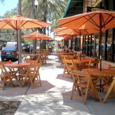Round Folding Table (Options: 42", 4 Folding Chairs, Douglas-Fir, No Cushions, Standard Tabletop, Checkerboard Design, Visible Screw Placement, Umbrella Hole, Transparent Premium Sealant). Photo Courtesy of Messineo's Gourmet Market, St. Petersburg, FL.