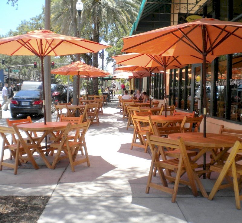 Redwood Round Folding Table and Chairs (Options: 42", 4 Folding Chairs, Douglas-Fir, No Cushions, Standard Tabletop, Checkerboard Design, Visible Screw Placement, Umbrella Hole, Transparent Premium Sealant). Photo Courtesy of Messineo's Gourmet Market, St. Petersburg, FL. Redwood Round Folding Table and Chairs (Options: 42", 4 Folding Chairs, Douglas-Fir, No Cushions, Standard Tabletop, Checkerboard Design, Visible Screw Placement, Umbrella Hole, Transparent Premium Sealant). Photo Courtesy of Messineo's Gourmet Market, St. Petersburg, FL.