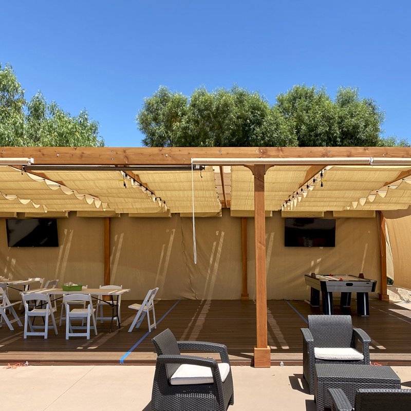 Retractable Canopy Pergola (Options: 24' W x 40' L, Douglas-fir, 8-Post Anchor Kit for Concrete, Transparent Premium Sealant). Photo Courtesy of El Paseo Tennis Club of Valencia, CA. Retractable Canopy Pergola (Options: 24' W x 40' L, Douglas-fir, 8-Post Anchor Kit for Concrete, Transparent Premium Sealant). Photo Courtesy of El Paseo Tennis Club of Valencia, CA.