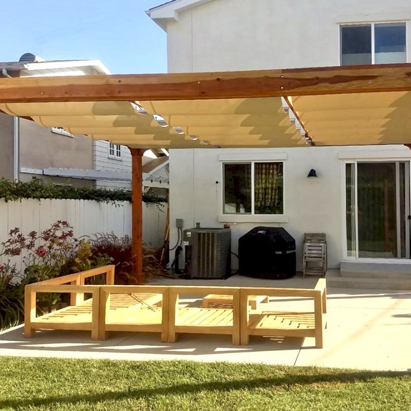 Retractable Canopy Pergola (Options: 18' L x 14' W, No Privacy Panel, California Redwood, 10' Post Height, 1 Electrical Wiring Trim, Post Anchor Kit for Concrete, No Post Decorative Trim, No Ceiling Fan Base, No Curtain Rods Transparent Premium Sealant). Photo Courtesy of D. Evans of Los Angeles, California. Retractable Canopy Pergola (Options: 18' L x 14' W, No Privacy Panel, California Redwood, 10' Post Height, 1 Electrical Wiring Trim, Post Anchor Kit for Concrete, No Post Decorative Trim, No Ceiling Fan Base, No Curtain Rods Transparent Premium Sealant). Photo Courtesy of D. Evans of Los Angeles, California.