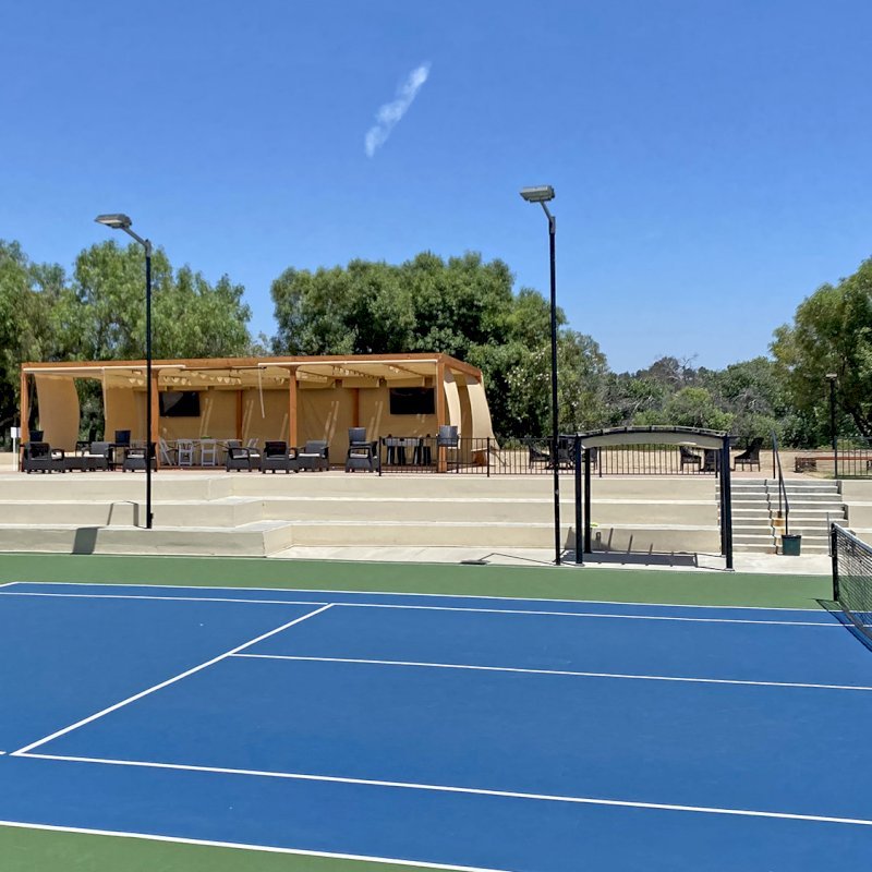 Retractable Canopy Pergola (Options: 24' W x 40' L, Douglas-fir, 8-Post Anchor Kit for Concrete, Transparent Premium Sealant). Photo Courtesy of El Paseo Tennis Club of Valencia, CA. Retractable Canopy Pergola (Options: 24' W x 40' L, Douglas-fir, 8-Post Anchor Kit for Concrete, Transparent Premium Sealant). Photo Courtesy of El Paseo Tennis Club of Valencia, CA.