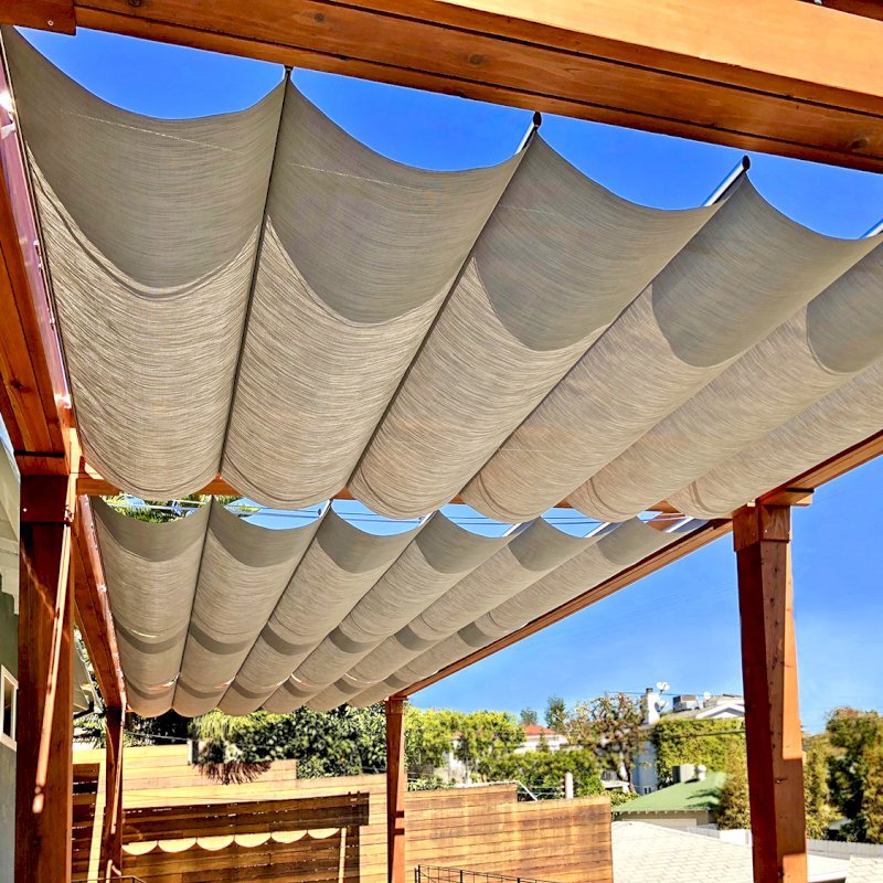 Retractable Canopy Pergola (Options: 30' L x 12' W, No Privacy Panel, Mature Redwood, 8 x 8 Posts by Custom Request, 10 ft Post Height, No Electrical Wiring Trim, Post Anchor Kit for Concrete, No Post Decorative Trim, No Ceiling Fan Base, No Curtain Rods, Transparent Premium Sealant, Overhang of Supports by Custom Request). Photo Courtesy of J. Herr of Venice, CA. Retractable Canopy Pergola (Options: 30' L x 12' W, No Privacy Panel, Mature Redwood, 8 x 8 Posts by Custom Request, 10 ft Post Height, No Electrical Wiring Trim, Post Anchor Kit for Concrete, No Post Decorative Trim, No Ceiling Fan Base, No Curtain Rods, Transparent Premium Sealant, Overhang of Supports by Custom Request). Photo Courtesy of J. Herr of Venice, CA.