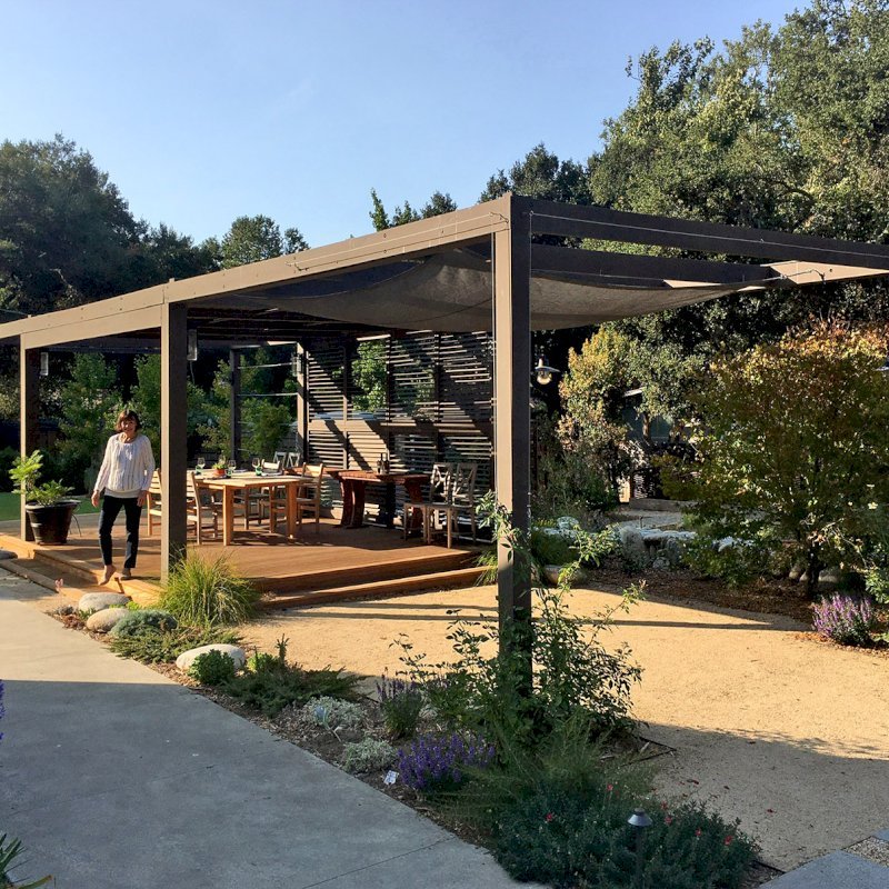 Custom Retractable Canopy Pergola (Options: 40' L x 14' W, 1 Privacy Panel Louvered, Douglas-fir, With Louvered Panels in the Center Section of the Roof, 10 ft Post Height, 8-Post Anchor Kit for Concrete, No Electrical Wiring Trim, No Post Decorative Trim, No Ceiling Fan Base, No Curtain Rods, Custom Paint). Photo Courtesy of R. Clark of Carmel Valley, California. Custom Retractable Canopy Pergola (Options: 40' L x 14' W, 1 Privacy Panel Louvered, Douglas-fir, With Louvered Panels in the Center Section of the Roof, 10 ft Post Height, 8-Post Anchor Kit for Concrete, No Electrical Wiring Trim, No Post Decorative Trim, No Ceiling Fan Base, No Curtain Rods, Custom Paint). Photo Courtesy of R. Clark of Carmel Valley, California.