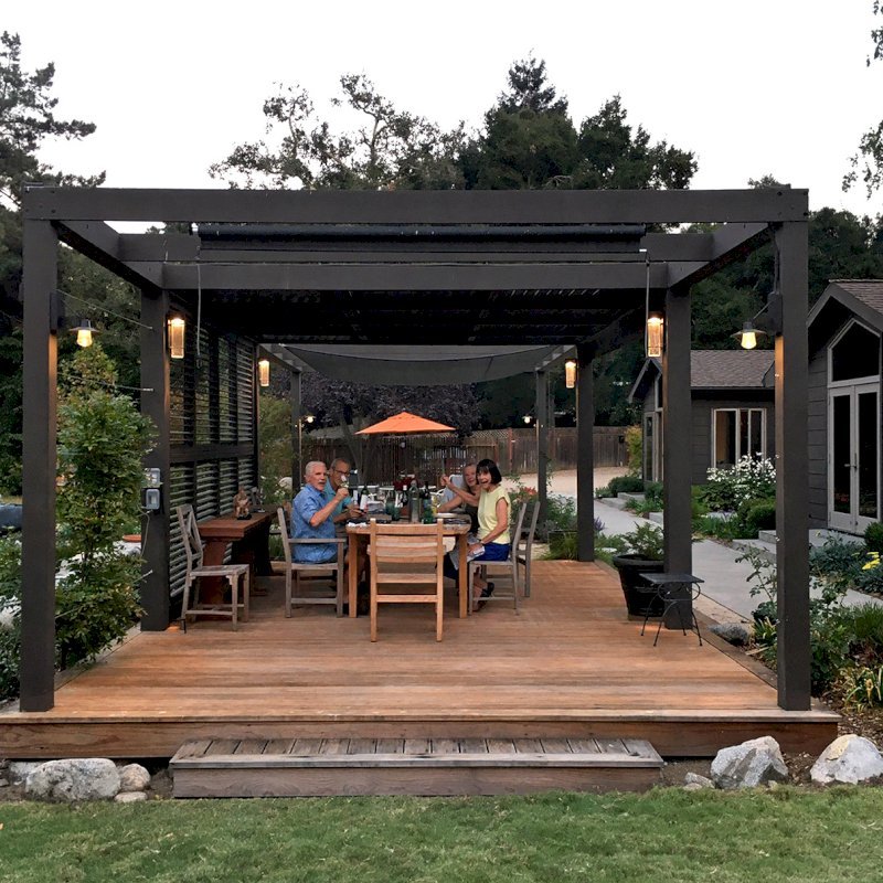 Custom Retractable Canopy Pergola (Options: 40' L x 14' W, 1 Privacy Panel Louvered, Douglas-fir, With Louvered Panels in the Center Section of the Roof, 10 ft Post Height, 8-Post Anchor Kit for Concrete, No Electrical Wiring Trim, No Post Decorative Trim, No Ceiling Fan Base, No Curtain Rods, Custom Paint). Photo Courtesy of R. Clark of Carmel Valley, California. Custom Retractable Canopy Pergola (Options: 40' L x 14' W, 1 Privacy Panel Louvered, Douglas-fir, With Louvered Panels in the Center Section of the Roof, 10 ft Post Height, 8-Post Anchor Kit for Concrete, No Electrical Wiring Trim, No Post Decorative Trim, No Ceiling Fan Base, No Curtain Rods, Custom Paint). Photo Courtesy of R. Clark of Carmel Valley, California.
