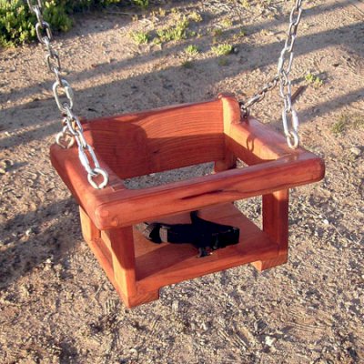 Small kids? Get a Toddler/Small Kid's Swing Seat instead of the Rory's swing seat (option available in the product configurator). Photo Shows Mature Redwood with Transparent Premium Sealant.  Safety strap and all the hardware comes with any swing set order