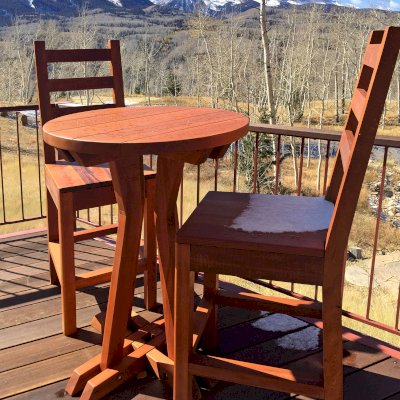 Round Cocktail Table (Options: Std Round Cocktail Table, Ladderback Stools, Old-Growth Redwood, 29" H Seat, No Cushion, 42" H Table, Standard Tabletop, Transparent Premium Sealant). Photo Courtesy of P. Sigel of Telluride, Colorado.
