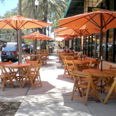 Round Folding Table (Options: 42", 4 Folding Chairs, Douglas-Fir, No Cushions, Standard Tabletop, Checkerboard Design, Visible Screw Placement, Umbrella Hole, Transparent Premium Sealant). Photo Courtesy of Messineo's Gourmet Market, St. Petersburg, FL.