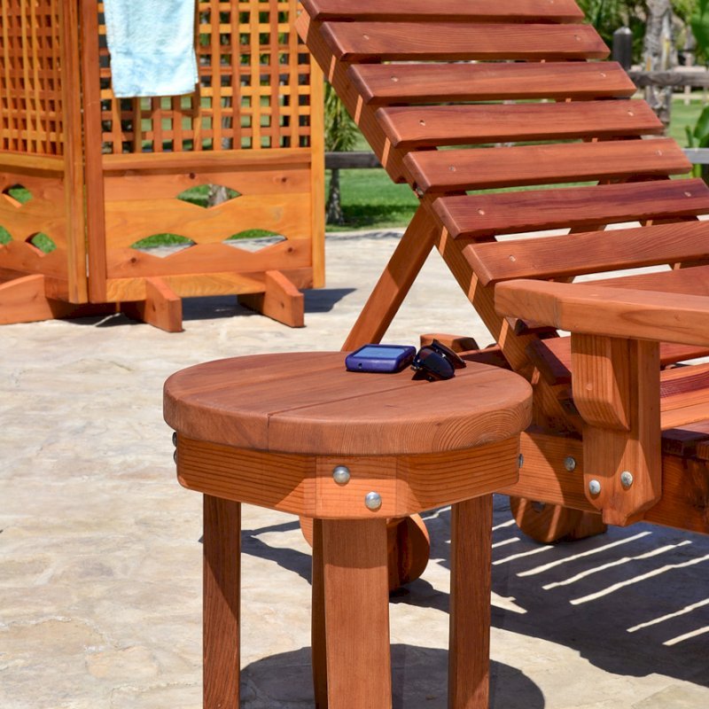 Round Solid Wood Side Table (Options: 18" size, Old-Growth Redwood, Rounded Apron, 18"H, Transparent Premium Sealant). Photo also shows The Poolside Privacy Panel and Sol Lounger. Round Solid Wood Side Table (Options: 18" size, Old-Growth Redwood, Rounded Apron, 18"H, Transparent Premium Sealant). Photo also shows The Poolside Privacy Panel and Sol Lounger.