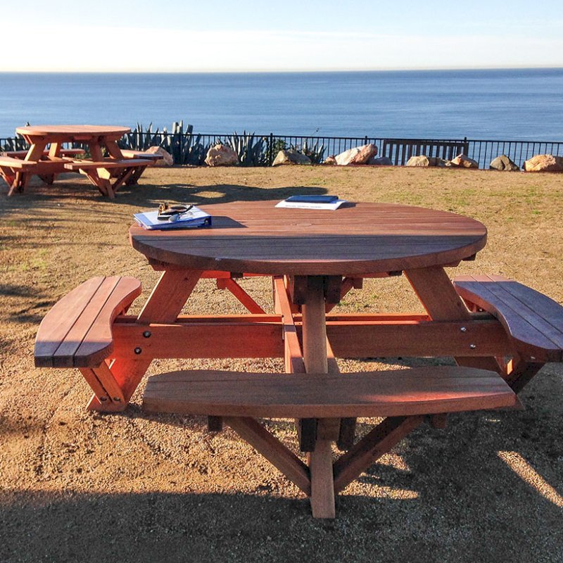 Round Wooden Picnic Tables (Attached Benches) (Options: 4 1/2' Diameter, Attached Benches, Douglas-fir, Standard Tabletop, No Lazy Susan, 2" Umbrella Hole & Plug, Transparent Premium Sealant). Photo Courtesy of Cynthia Hirschhorn of Pacific Palisades, CA. Round Wooden Picnic Tables (Attached Benches) (Options: 4 1/2' Diameter, Attached Benches, Douglas-fir, Standard Tabletop, No Lazy Susan, 2" Umbrella Hole & Plug, Transparent Premium Sealant). Photo Courtesy of Cynthia Hirschhorn of Pacific Palisades, CA.