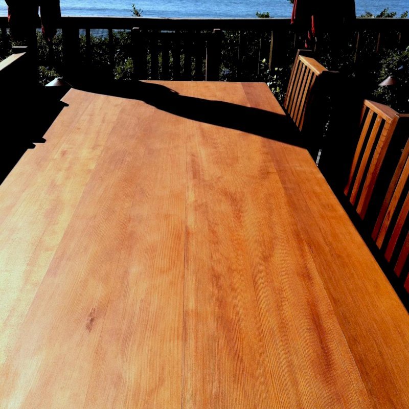 Seamless tabletop detail photo (Options: 8'L, 40 1/4" W Tabletop, Chairs, Old-Growth Redwood, Seamless Tabletop, 6 Chairs, Ruth, All Side Chairs, No Cushion, Squared Corners, No Umbrella Hole, Transparent Premium Sealant). Seamless tabletop detail photo (Options: 8'L, 40 1/4" W Tabletop, Chairs, Old-Growth Redwood, Seamless Tabletop, 6 Chairs, Ruth, All Side Chairs, No Cushion, Squared Corners, No Umbrella Hole, Transparent Premium Sealant).