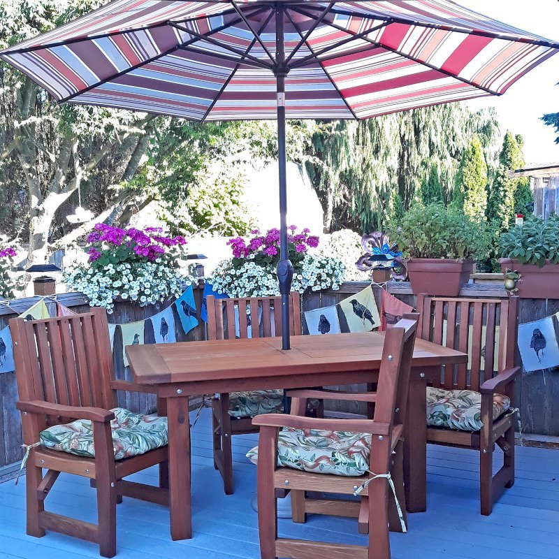 San Francisco Redwood Patio Table (Options: 5' L, 34 1/2" W Tabletop, Chairs, California Redwood, 4 Chairs, Ruth Chair Design, All Arm Chairs, Custom Cushions, Old Country Tabletop, Standard, Slightly Rounded Corners, 1 5/8" Umbrella Hole, Transparent Premium Sealant). Photo Courtesy of E. Salscheider of Tacoma, Washington. San Francisco Redwood Patio Table (Options: 5' L, 34 1/2" W Tabletop, Chairs, California Redwood, 4 Chairs, Ruth Chair Design, All Arm Chairs, Custom Cushions, Old Country Tabletop, Standard, Slightly Rounded Corners, 1 5/8" Umbrella Hole, Transparent Premium Sealant). Photo Courtesy of E. Salscheider of Tacoma, Washington.