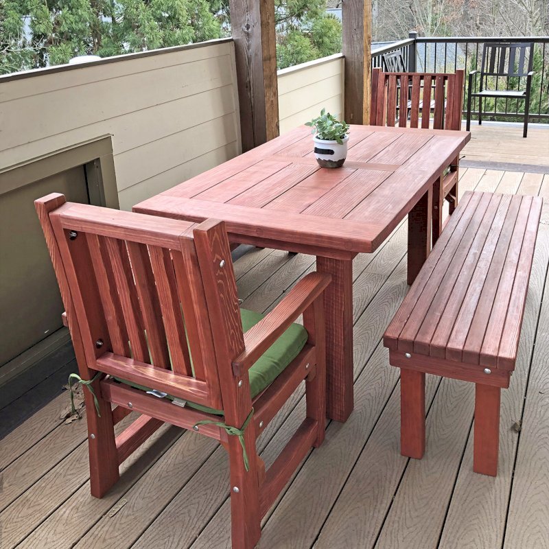 San Francisco Redwood Patio Table (Options: 5' L, 36" W Tabletop, Benches & End Armchairs , California Redwood, Ruth Chairs, No Cushions, Patio Benches, 1 Full Length Benches Per Side, Old Country Tabletop, Standard, Slightly Rounded Corners, No Umbrella Hole, Cherry Stain Premium Sealant). Photo Courtesy of J. Jimene of Smyrna, Georgia. San Francisco Redwood Patio Table (Options: 5' L, 36" W Tabletop, Benches & End Armchairs , California Redwood, Ruth Chairs, No Cushions, Patio Benches, 1 Full Length Benches Per Side, Old Country Tabletop, Standard, Slightly Rounded Corners, No Umbrella Hole, Cherry Stain Premium Sealant). Photo Courtesy of J. Jimene of Smyrna, Georgia.