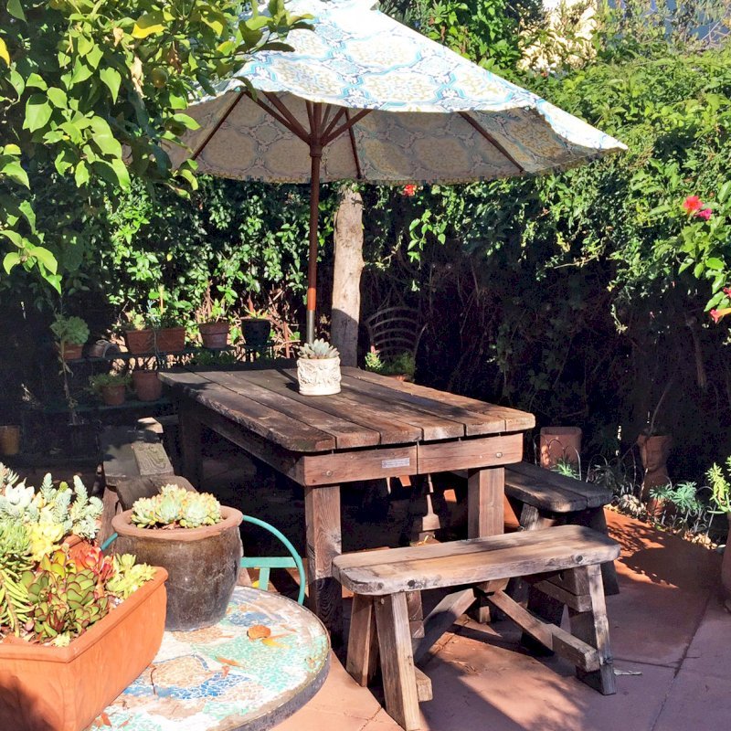 San Francisco Redwood Patio Table. Photo Courtesy of Lisa Hanauer. This photo shows a well used table that was 10 years old when these photos were taken. San Francisco Redwood Patio Table. Photo Courtesy of Lisa Hanauer. This photo shows a well used table that was 10 years old when these photos were taken.