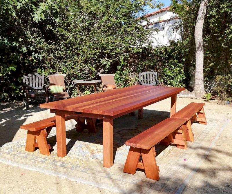 San Francisco Redwood Patio Table (Options: 10' L, 48" W Tabletop, California Redwood, Side Benches, Classic Picnic Benches, Standard Tabletop, Slightly Rounded Corners, 2 Half Length Benches Per Side, No Umbrella Hole, Transparent Premium Sealant). Photo Courtesy of R. Calip od Los Angeles, California. San Francisco Redwood Patio Table (Options: 10' L, 48" W Tabletop, California Redwood, Side Benches, Classic Picnic Benches, Standard Tabletop, Slightly Rounded Corners, 2 Half Length Benches Per Side, No Umbrella Hole, Transparent Premium Sealant). Photo Courtesy of R. Calip od Los Angeles, California.