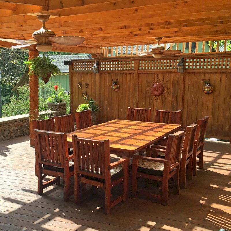 San Francisco Redwood Patio Table (Options: 10' L, 57 1/2" W Tabletop, Chairs, Douglas-fir, 10 Chairs, Ruth Chair Design, All Armchairs, Custom Cushions, Old-Country Standard Tabletop, Rounded Corners, No Umbrella Hole, Transparent Premium Sealant). Photo Courtesy of Alexis Horvath. San Francisco Redwood Patio Table (Options: 10' L, 57 1/2" W Tabletop, Chairs, Douglas-fir, 10 Chairs, Ruth Chair Design, All Armchairs, Custom Cushions, Old-Country Standard Tabletop, Rounded Corners, No Umbrella Hole, Transparent Premium Sealant). Photo Courtesy of Alexis Horvath.