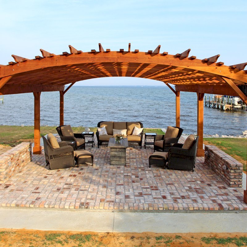 Sebastopol Pergolas (Options: 32' L x 24' Arc W, California Redwood, 6-Post Anchor Kit for Hurricane, No Ceiling Fan Base, Transparent Premium Sealant). Photo Courtesy of J. Graves of Santa Rosa Beach, Florida. Sebastopol Pergolas (Options: 32' L x 24' Arc W, California Redwood, 6-Post Anchor Kit for Hurricane, No Ceiling Fan Base, Transparent Premium Sealant). Photo Courtesy of J. Graves of Santa Rosa Beach, Florida.