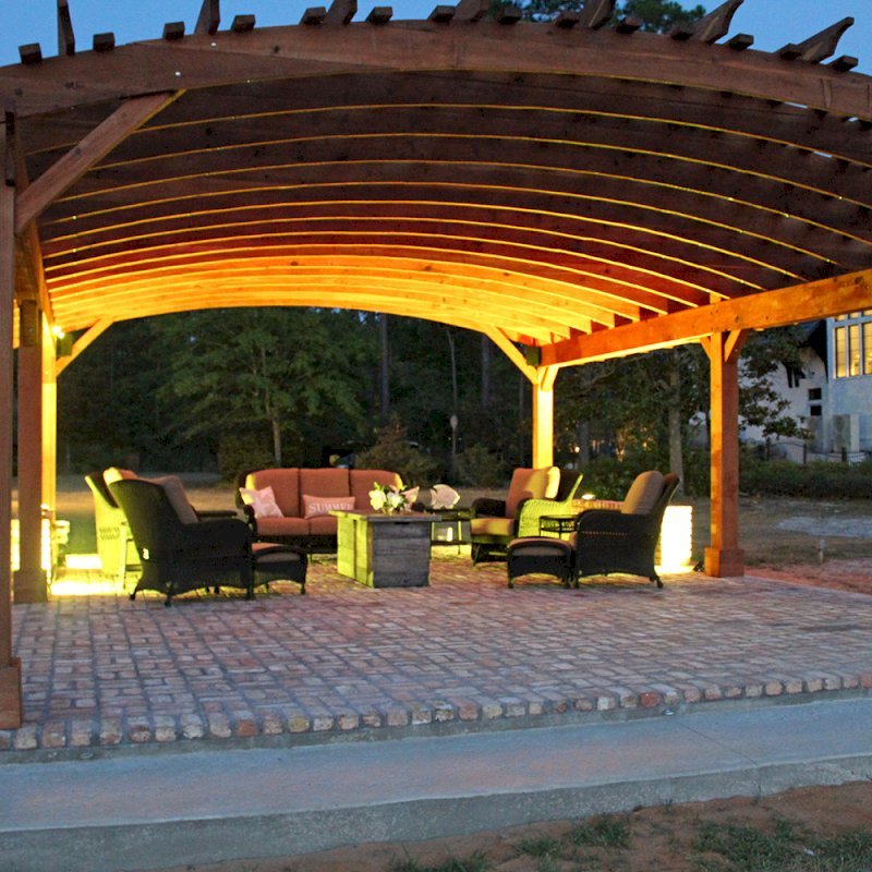 Sebastopol Pergolas (Options: 32' L x 24' Arc W, California Redwood, 6-Post Anchor Kit for Hurricane, No Ceiling Fan Base, Transparent Premium Sealant). Photo Courtesy of J. Graves of Santa Rosa Beach, Florida. Sebastopol Pergolas (Options: 32' L x 24' Arc W, California Redwood, 6-Post Anchor Kit for Hurricane, No Ceiling Fan Base, Transparent Premium Sealant). Photo Courtesy of J. Graves of Santa Rosa Beach, Florida.
