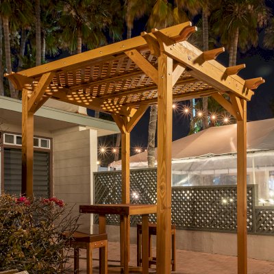 Small Lattice Pergola  (Options: 8' L x 8' W, No Privacy Panels, Douglas-fir, No Rain Guard, 8 ft Post Height, No Electrical Wiring Kit, No Post Decorative Trim, No Anchor Kit, No Curtain Rods, No Retractable Shade Canopy, Transparent Premium Sealant). Glady's Balcony Table Set Under the Pergola.