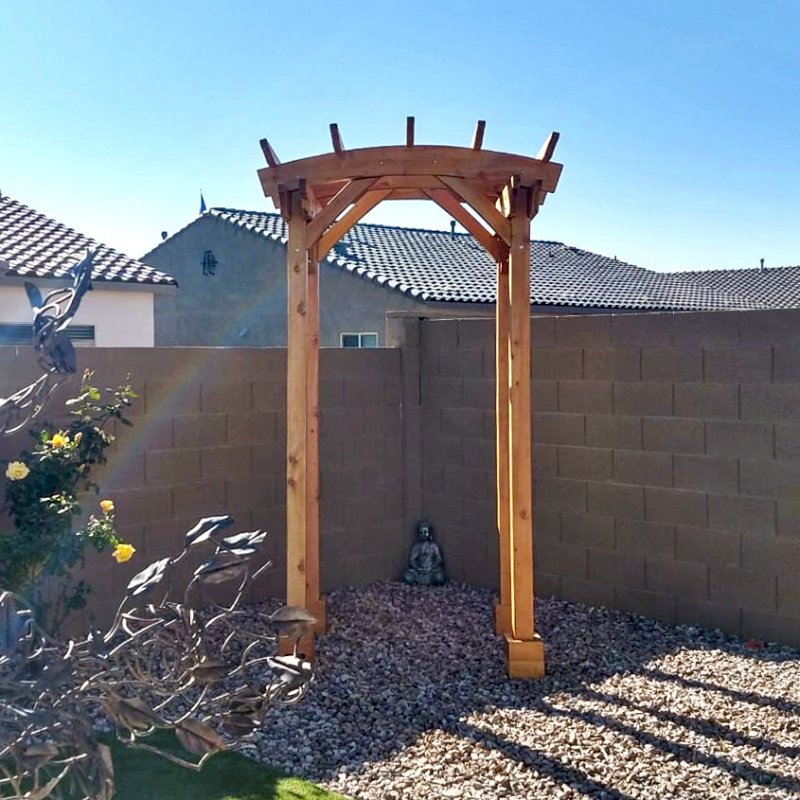 Small Pergola (Options: 5' x 5', Arched Type, 2x6's Supports and Rafters by Custom Request, California Redwood, Open Roof with Slats at 18", Rafters at 18", 8.5 ft Post Height, Transparent Premium Sealant). Photo Courtesy of M. Hall of Peoria, Arizona. Small Pergola (Options: 5' x 5', Arched Type, 2x6's Supports and Rafters by Custom Request, California Redwood, Open Roof with Slats at 18", Rafters at 18", 8.5 ft Post Height, Transparent Premium Sealant). Photo Courtesy of M. Hall of Peoria, Arizona.