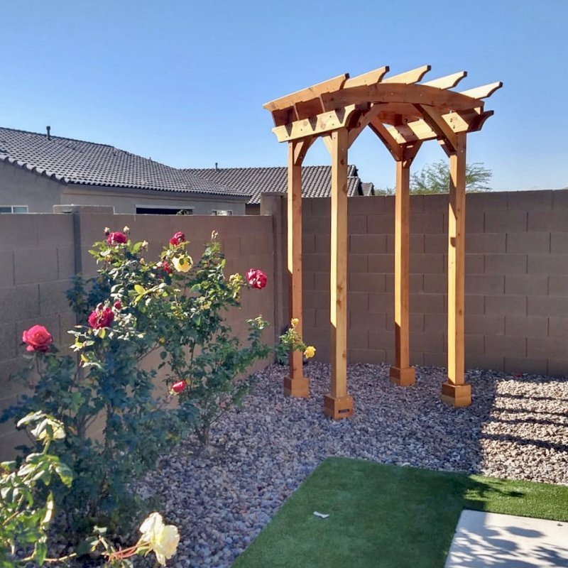 Small Pergola (Options: 5' x 5', Arched Type, 2x6's Supports and Rafters by Custom Request, California Redwood, Open Roof with Slats at 18", Rafters at 18", 8.5 ft Post Height, Transparent Premium Sealant). Photo Courtesy of M. Hall of Peoria, Arizona. Small Pergola (Options: 5' x 5', Arched Type, 2x6's Supports and Rafters by Custom Request, California Redwood, Open Roof with Slats at 18", Rafters at 18", 8.5 ft Post Height, Transparent Premium Sealant). Photo Courtesy of M. Hall of Peoria, Arizona.