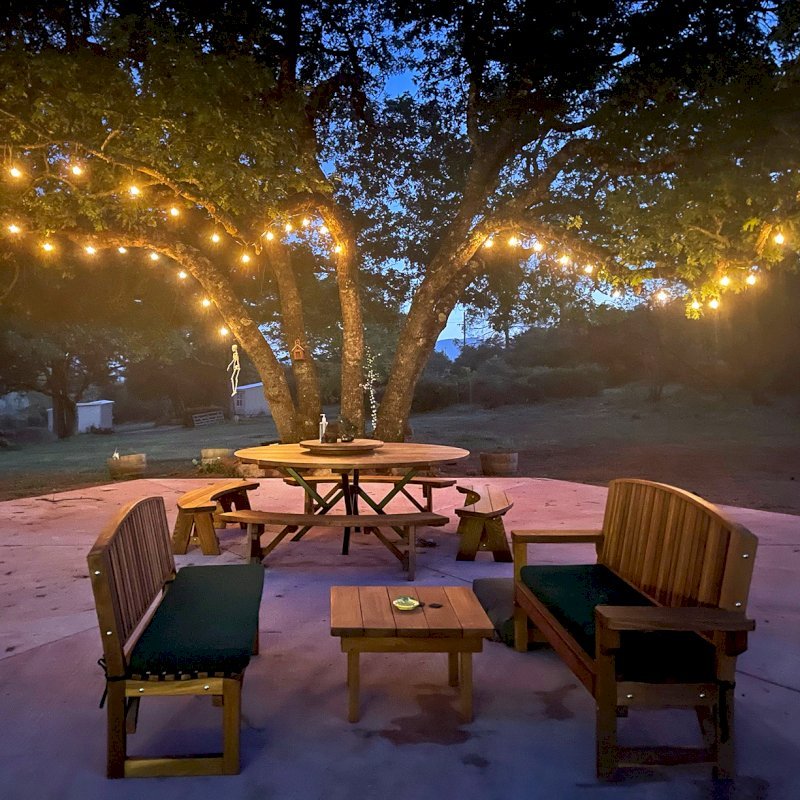 Square Side Table (Options: 30" Size, California Redwood, Slightly Rounded Corners, 18" H, Transparent Premium Sealant). Photo also shows 2 Moonlight Benches and a Custom Round Picnic Table Set. Photo Courtesy of A. Paul of Lower Lake, CA. Square Side Table (Options: 30" Size, California Redwood, Slightly Rounded Corners, 18" H, Transparent Premium Sealant). Photo also shows 2 Moonlight Benches and a Custom Round Picnic Table Set. Photo Courtesy of A. Paul of Lower Lake, CA.