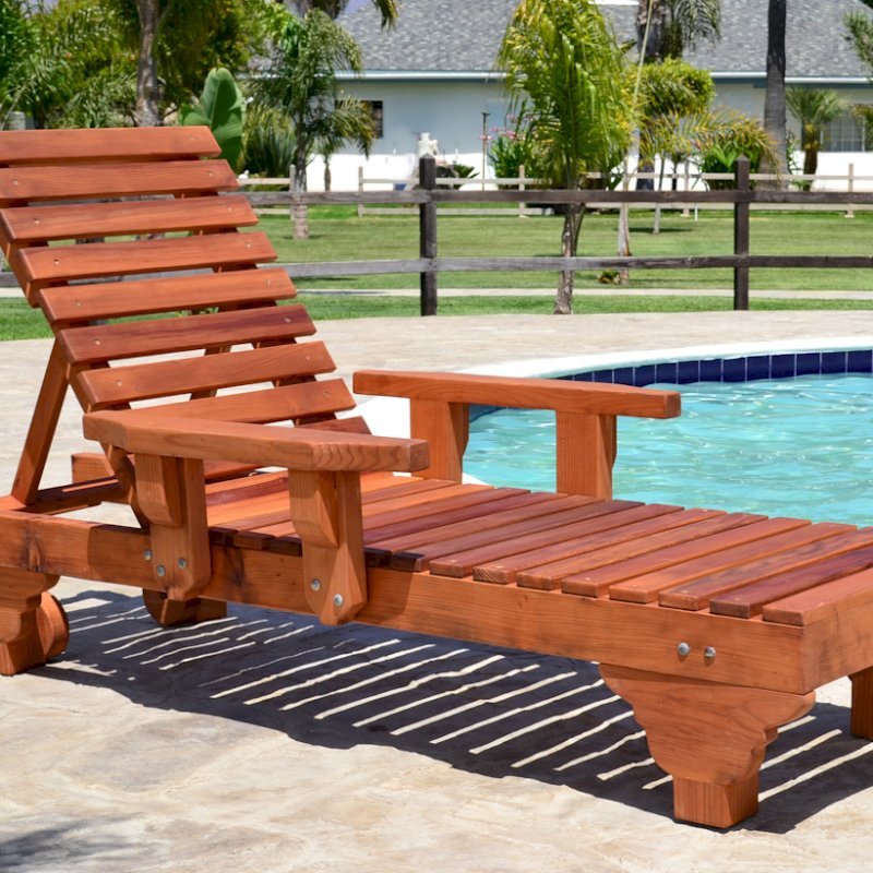 Sol Redwood Patio Lounger (Options: Single, Extra Large 78", Mature Redwood, Add Armrests, 13"H, Include Wooden Wheels, Transparent Premium Sealant). Photo also shows: The Poolside Privacy Panel Sol Redwood Patio Lounger (Options: Single, Extra Large 78", Mature Redwood, Add Armrests, 13"H, Include Wooden Wheels, Transparent Premium Sealant). Photo also shows: The Poolside Privacy Panel