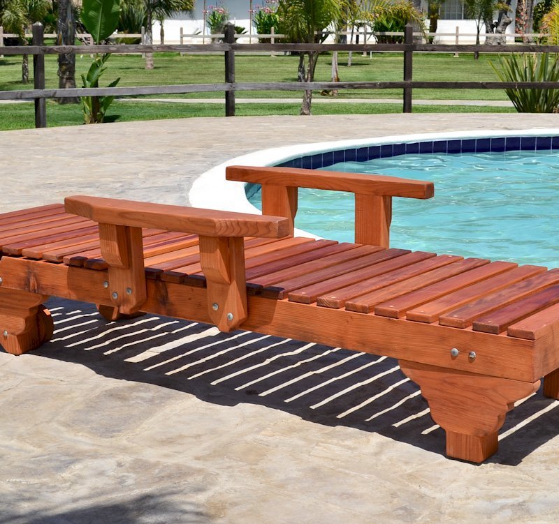 Sol Redwood Patio Lounger (Options: Single, Extra Large 78", Mature Redwood, Add Armrests, 13"H, Include Wooden Wheels, Transparent Premium Sealant). Photo also shows: The Poolside Privacy Panel Sol Redwood Patio Lounger (Options: Single, Extra Large 78", Mature Redwood, Add Armrests, 13"H, Include Wooden Wheels, Transparent Premium Sealant). Photo also shows: The Poolside Privacy Panel