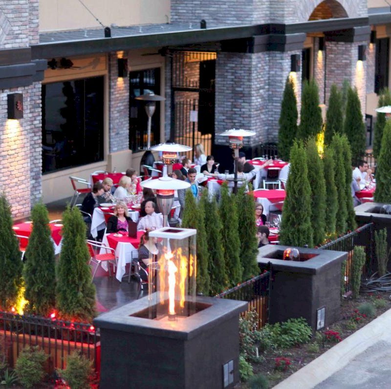 Sonoma Planters (Options: 96" L x 24" W x 24" H, Redwood, No Seating Ledge, Feet, No Trellis, No Growing Vegetables, Transparent Premium Sealant). Photo Courtesy of Savor Restaurant, Fayetteville, AK. Sonoma Planters (Options: 96" L x 24" W x 24" H, Redwood, No Seating Ledge, Feet, No Trellis, No Growing Vegetables, Transparent Premium Sealant). Photo Courtesy of Savor Restaurant, Fayetteville, AK.