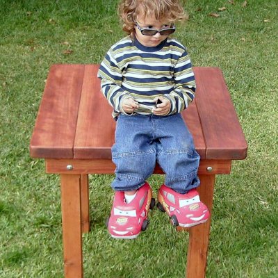 Square Patio Tables (Options: 2.5', No Seating, Mature Redwood, Standard Tabletop Option, Slightly Rounded Corners, No Umbrella Hole, Transparent Premium Sealant).  Makes an ideal seat to survey the scene and show off tasteful footwear too. 