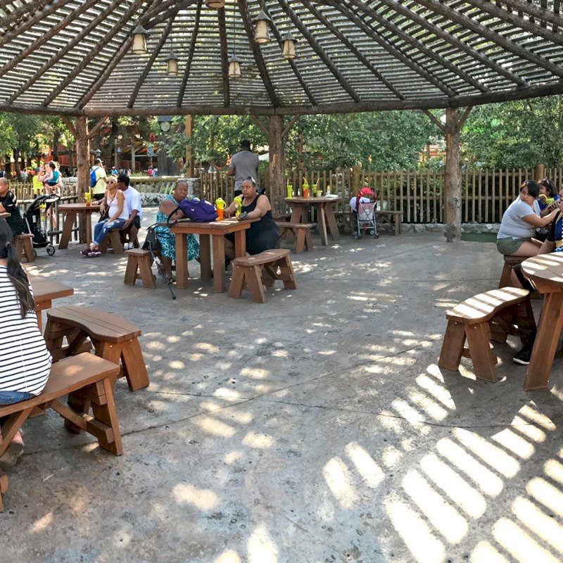 Square Patio Tables & Round Picnic Tables with Picnic Benches Installed in Knott's Berry Farm in Buena Park, California. Square Patio Tables & Round Picnic Tables with Picnic Benches Installed in Knott's Berry Farm in Buena Park, California.