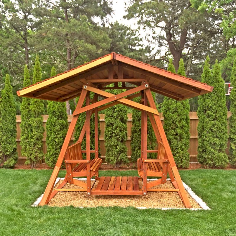 St. Anthony's Glider (XW Size, Redwood, No Kid's Platform, XW Roof, No Engraving, Transparent Premium Sealant). Photo Courtesy of C. Clairmont of Edgartown, Massachusetts. St. Anthony's Glider (XW Size, Redwood, No Kid's Platform, XW Roof, No Engraving, Transparent Premium Sealant). Photo Courtesy of C. Clairmont of Edgartown, Massachusetts.